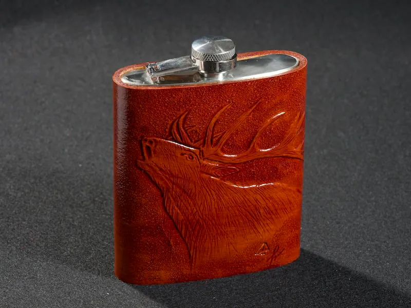 Metal pocket bottle covered in leather — hero
